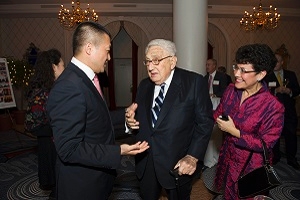 Gloria Gonzalez-Micklin with Dr. Henry Kissinger